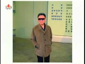 Christmas card photo?  Kim Jong-il grinning during his guidance tour of the Salmon Breeding Institute. (Photo: Korean Central News Agency)