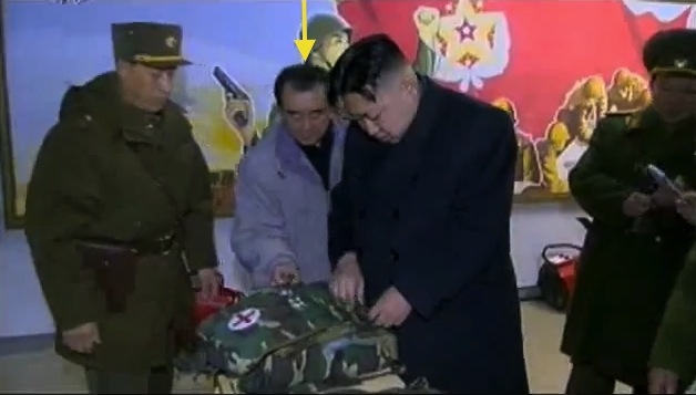 Kim Chang Son (annotated) assists Kim Jong Un's examination of first aid equipment during KJU's field inspection of KPA Unit #842 in February 2012 (Photo: KCTV screengrab)