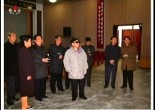 Kim Jong-il looking at production statistics at the Unhung Cooperative Farm. Jang Song-thaek and Ri Je-gang are on the left, looking like two old people gossiping in church. (Photo: KCNA)