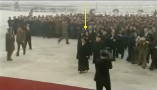 Aides assist members of the leadership, including Kim Kyong Hui (annotated), in removing their coats prior to entering the Ku'msusan Memorial Palace (Photo: KCTV/KCNA screengrab)