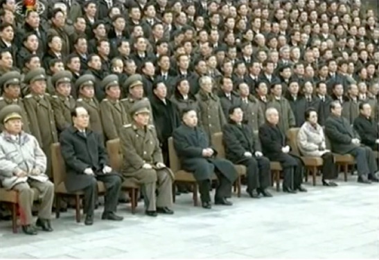 Kim Jong Un (4th L) sits for a commemorative photograph with personnel involved in the 12 February 2013 nuclear test (Photo: KCTV screengrab)