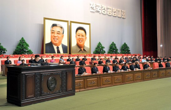 Kim Jong Un (L) speaks at  the national meeting of light industry workers in Pyongyang on 18 March 2013 (Photo: Rodong Sinmun)
