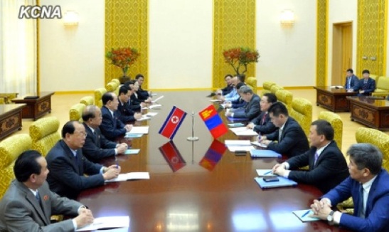 Mongolian President Tsakhiagiin Elbegdorj and a senior Mongolian Government delegation (R) meet with Kim Yong Nam and senior DPRK officials at Mansudae Assembly Hall in Pyongyang on 28 October 2013 (Photo: KCNA)