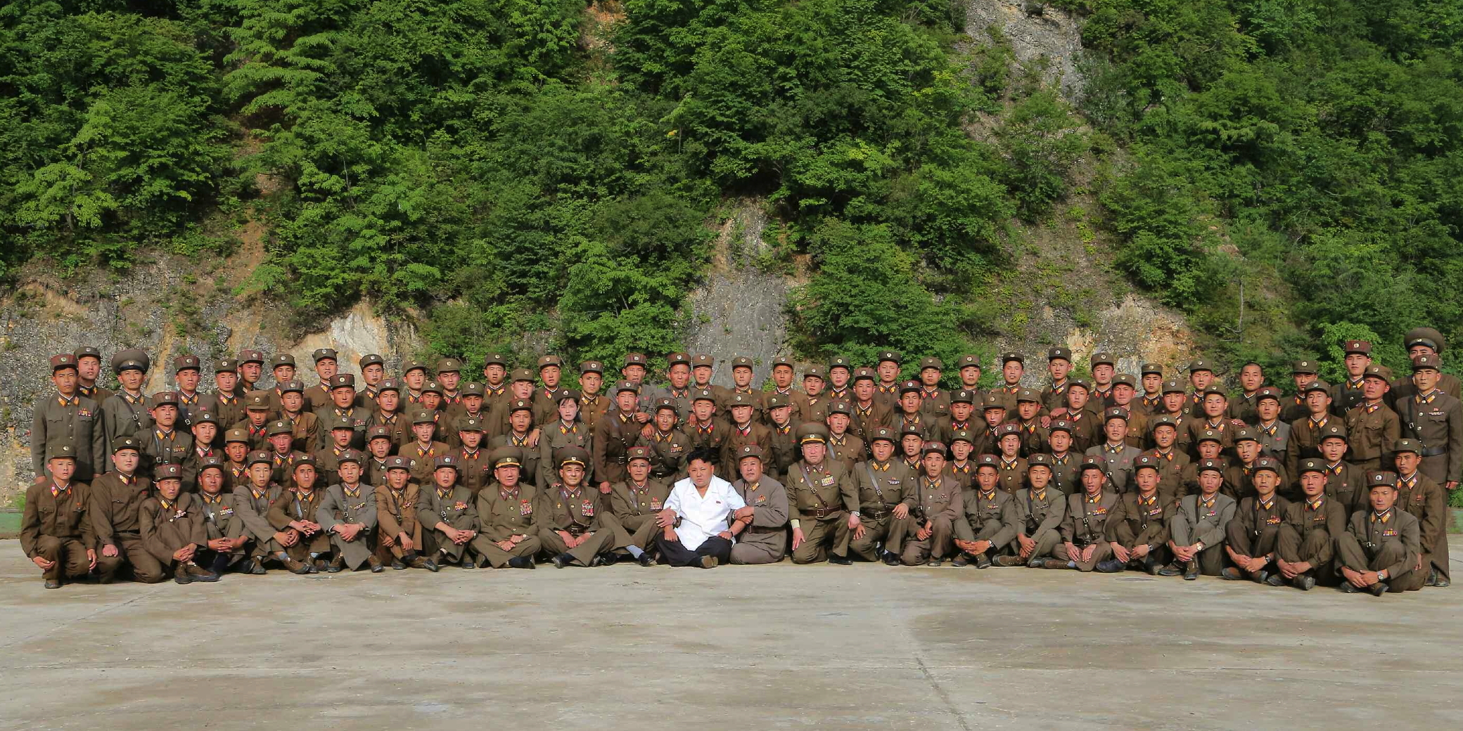 Kim Jong Un poses for a commemorative photo with participants in the KPA Strategic Rocket Force's 29 June 2014 drill that used two short-range Scud missiles (Photo: Rodong Sinmun).