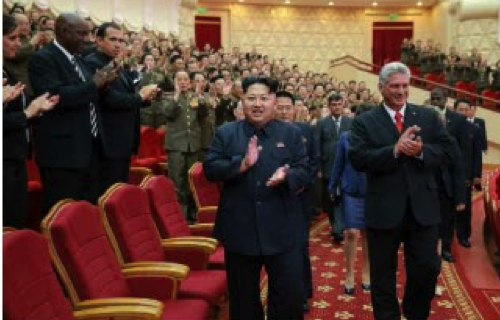 Kim Jong Un and Cuban Vice Preisdent Miguel Díaz-Canel Bermúdez (right) arrive at the venue of a concert held to mark the 55th anniversary of diplorels between the DPRK and Cuba (Photo: Rodong Sinmun/KCNA).  