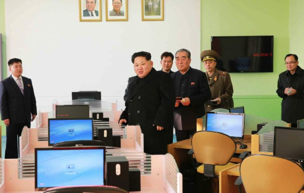 Kim Jong Un looks around a computer room at Mangyo'ngdae Schoolchildren's Palace (Photo: Rodong Sinmun).