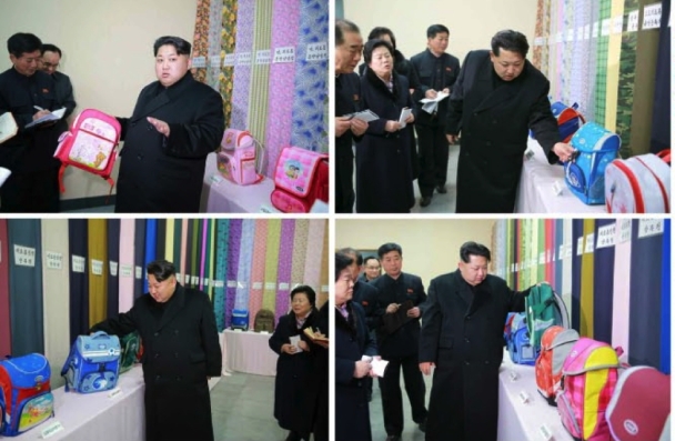 Kim Jong Un looks at schoolbags and other products of the Kim Jong Suk Textile Mill (Photos: KCNA).