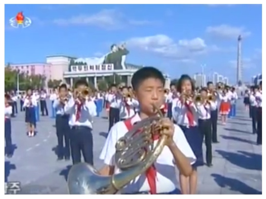 Cute kid plays french horn